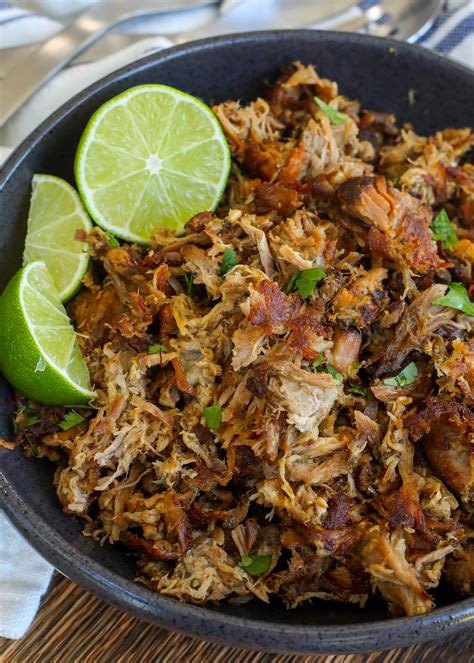 Top each with desired amount of guacamole, Rotelpico, and cheese, but don't overfill too much. . Slow cooked pork carnitas lazy dog
